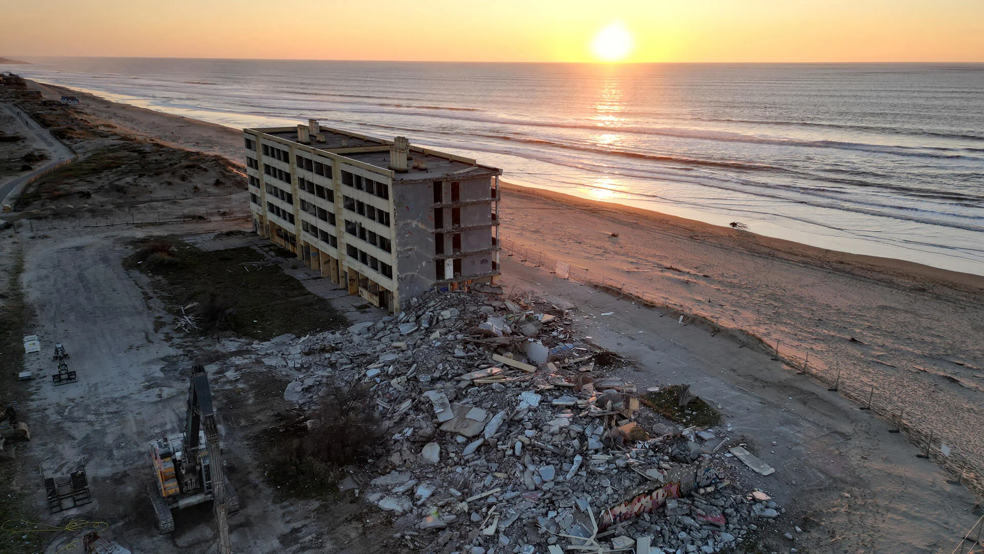 France tears down beach apartment block as rising sea bites