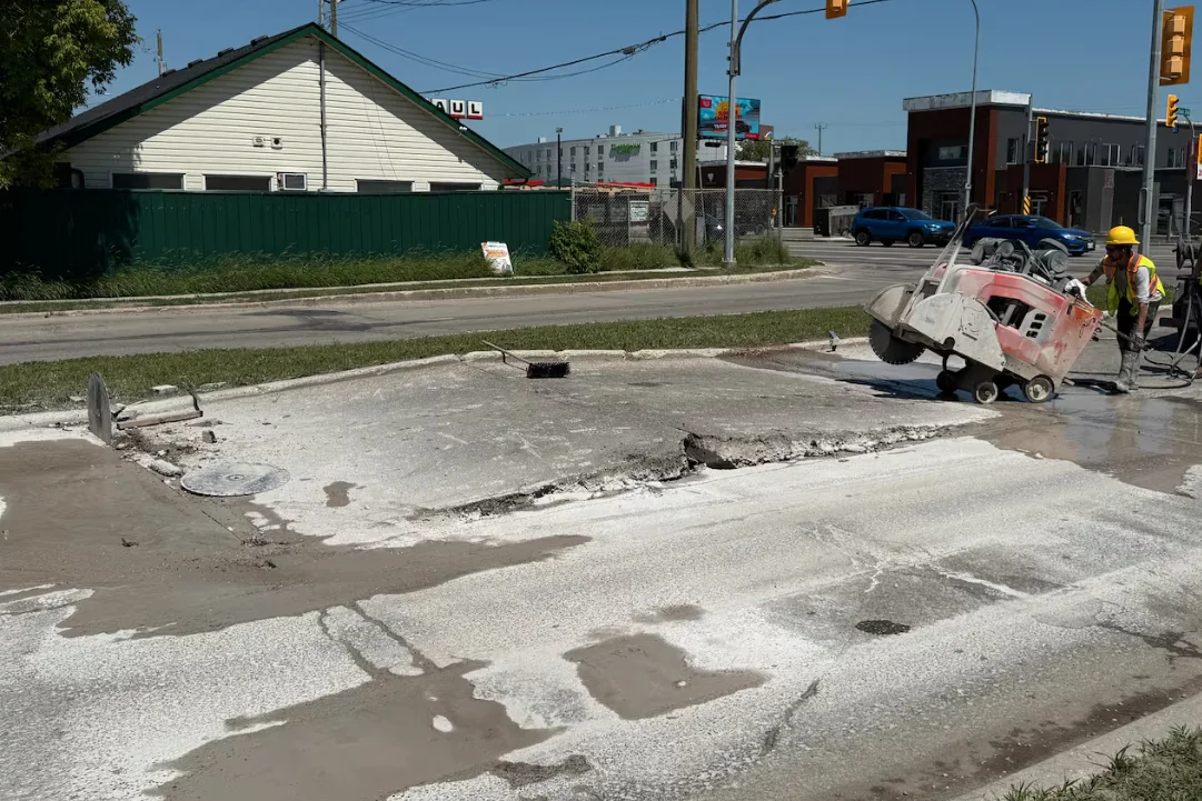 CBC - Crews repair buckled road in Winnipeg - Trevor Brine