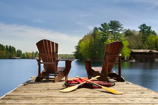 getty chairs dock lake summer