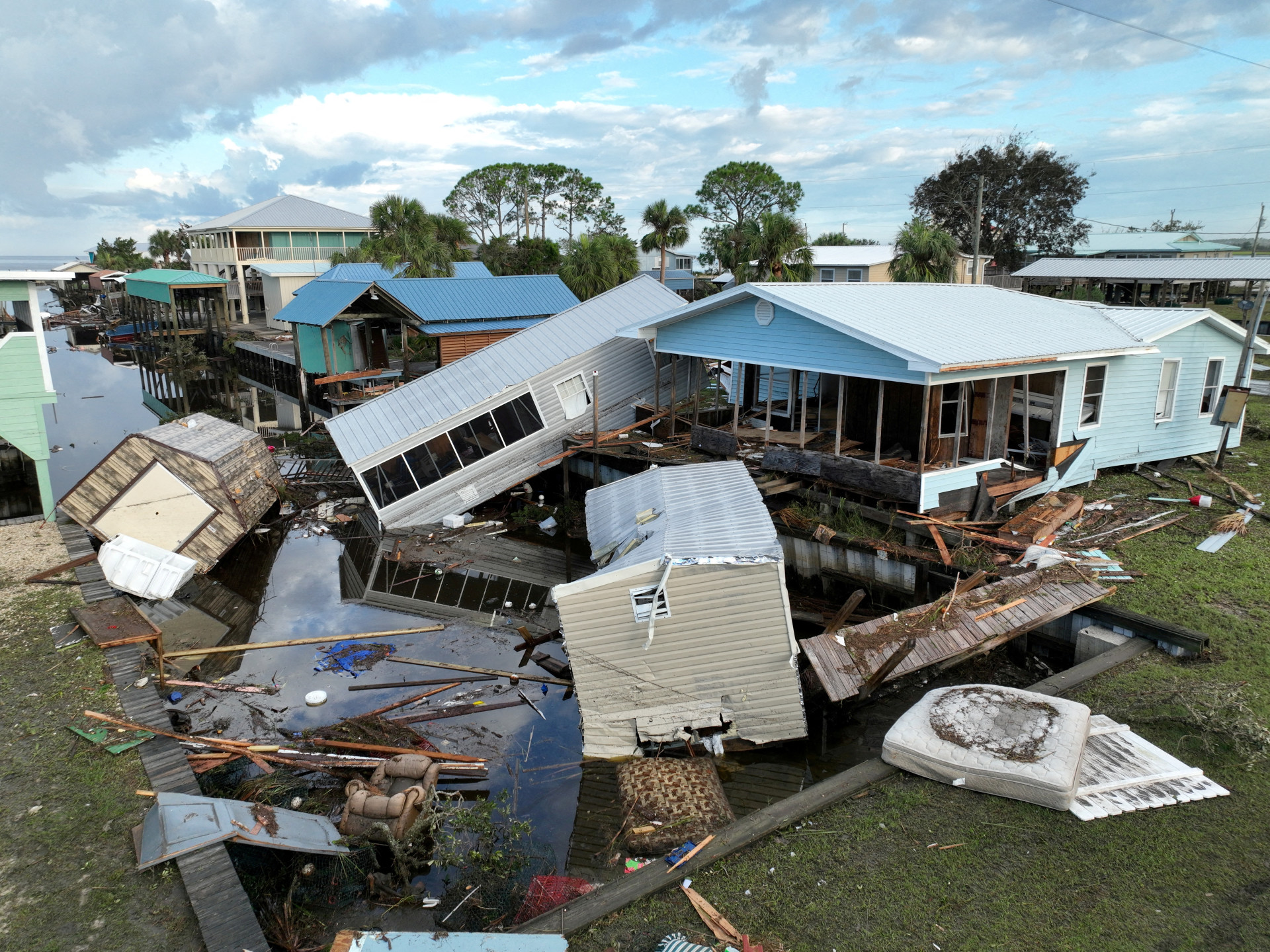 Reuters: View of a damaged property after the arrival of Hurricane Idalia in Horseshoe Beach, Florida, U.S., August 31, 2023. REUTERS/Julio Cesar Chavez/File Photo