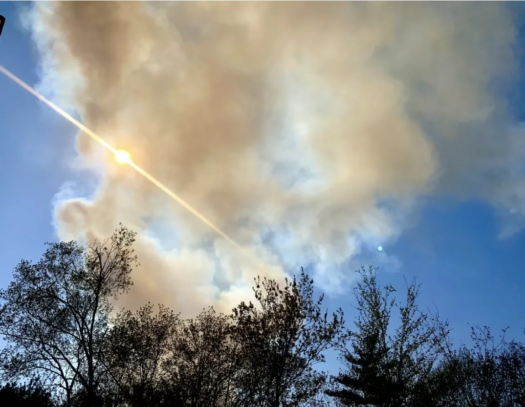 CBC: Smoke is seen billowing in the air in Highland Park in Hammonds Plains. (Aly Thomson/CBC)