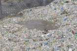 Largest river in Guatemala choked by garbage that causes "trash tsunamis"