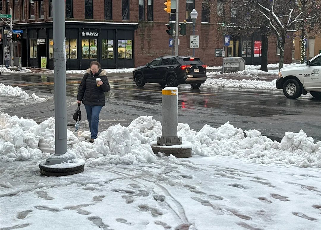 PHOTOS: Wintry weather brings power outages, school closures to New ...