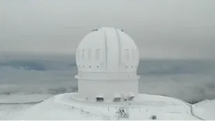 Hawaii's Mauna Kea summit sees first snow of the season