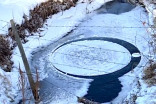 Mesmerizing 'satellite' ice disc captured on Alberta waterway (VIDEO)