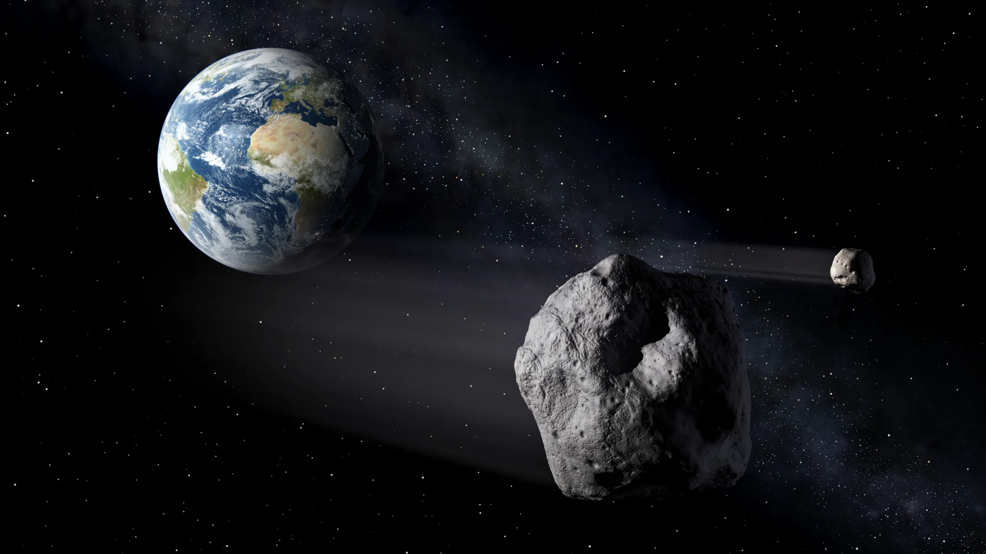 Two massive asteroids swing past Earth this week, but don't worry! We're safe!
