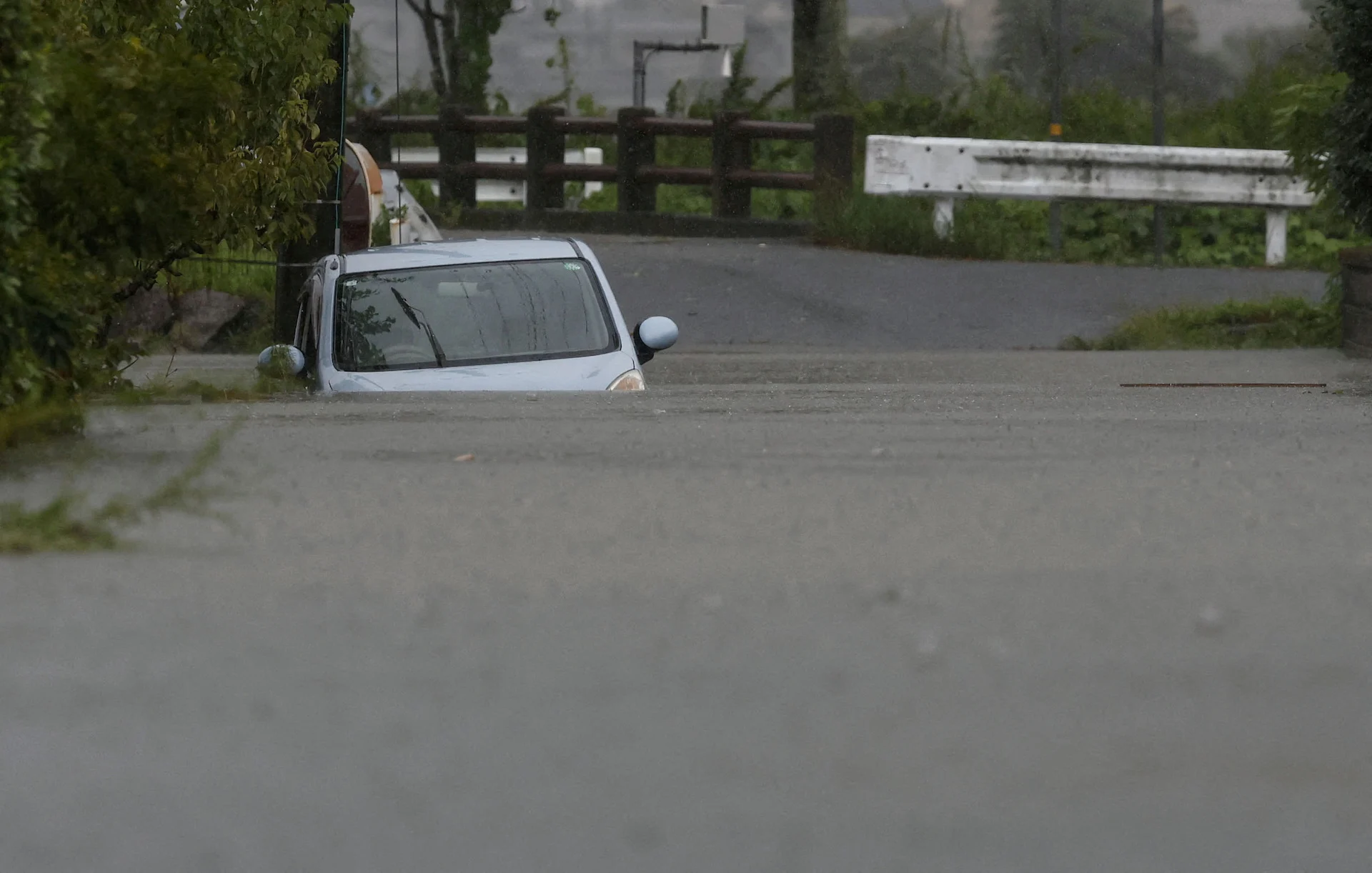 At least 6 dead in Japan as Typhoon Shanshan grinds on