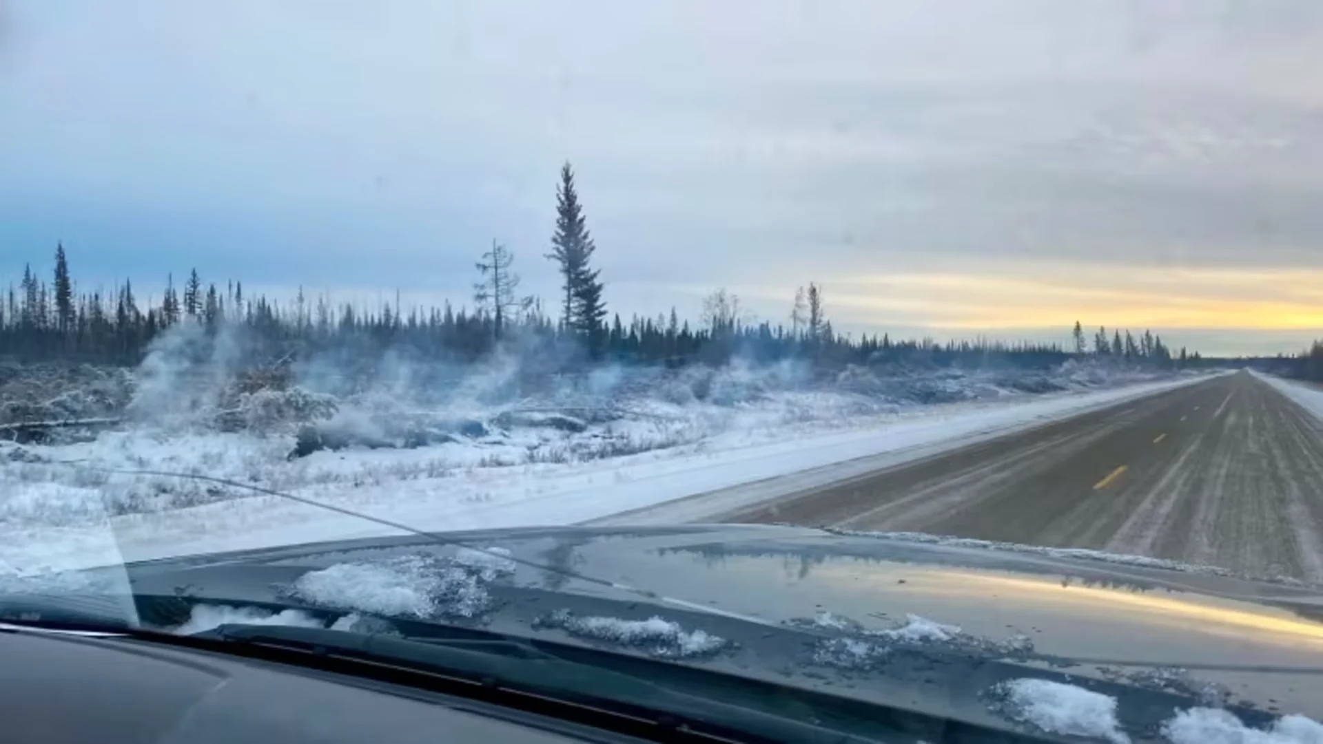Smoking snow shows 'holdover fires' still burning in N.W.T.