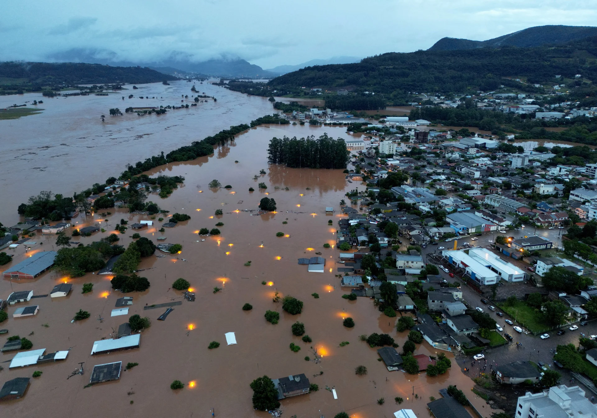 Reuters: A drone view of the flooded area next to the Taquari River during heavy rains in the city of Encantado in Rio Grande do Sul, Brazil, May 1, 2024. REUTERS/Diego Vara