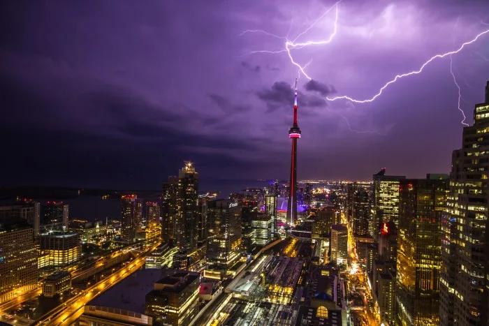 PHOTOS: CN Tower celebrates 45 years of weathering Toronto