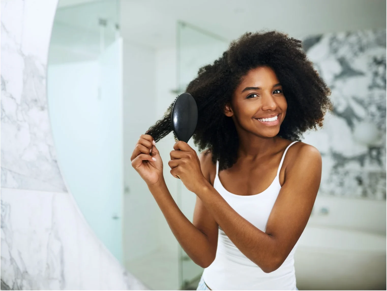 GETTY IMAGES: Detangling, brushing through hair