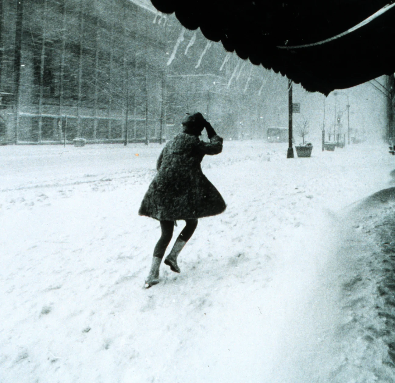 A street in New York City during the storm. This scene is in Manhattan, 1969.