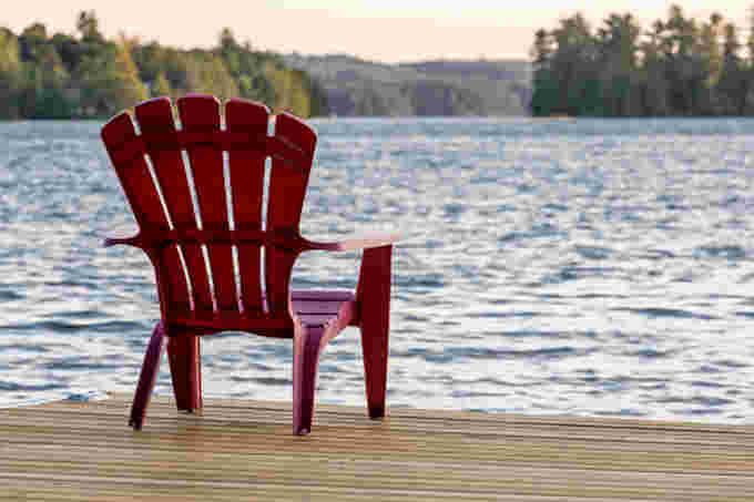 GETTY - Muskoka chair on lake (3)