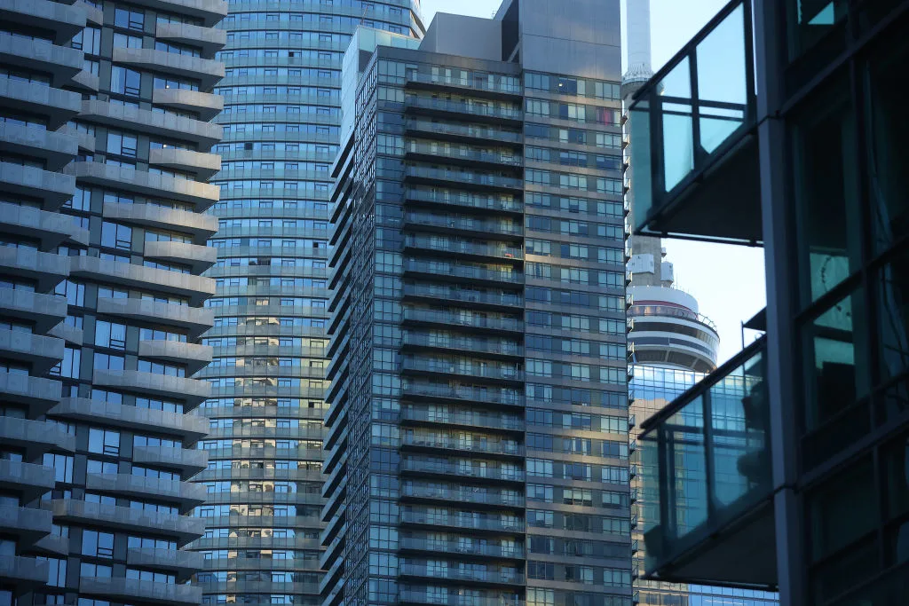 Condos cover the waterfront almost blocking views of the CN Tower in Toronto. July 30, 2022. (Steve Russell/Toronto Star via Getty Images)