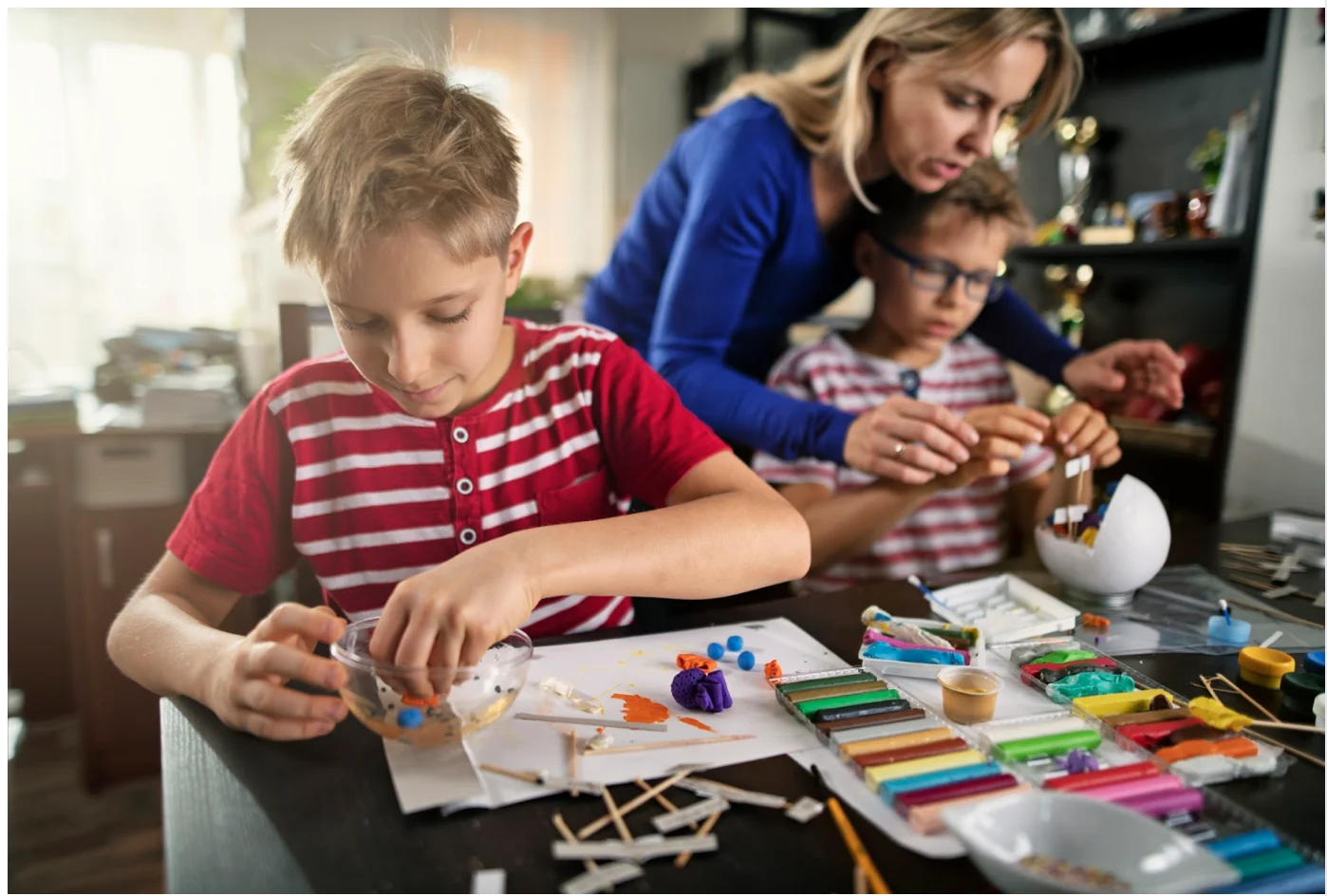 Getty Images: Children doing homework at home