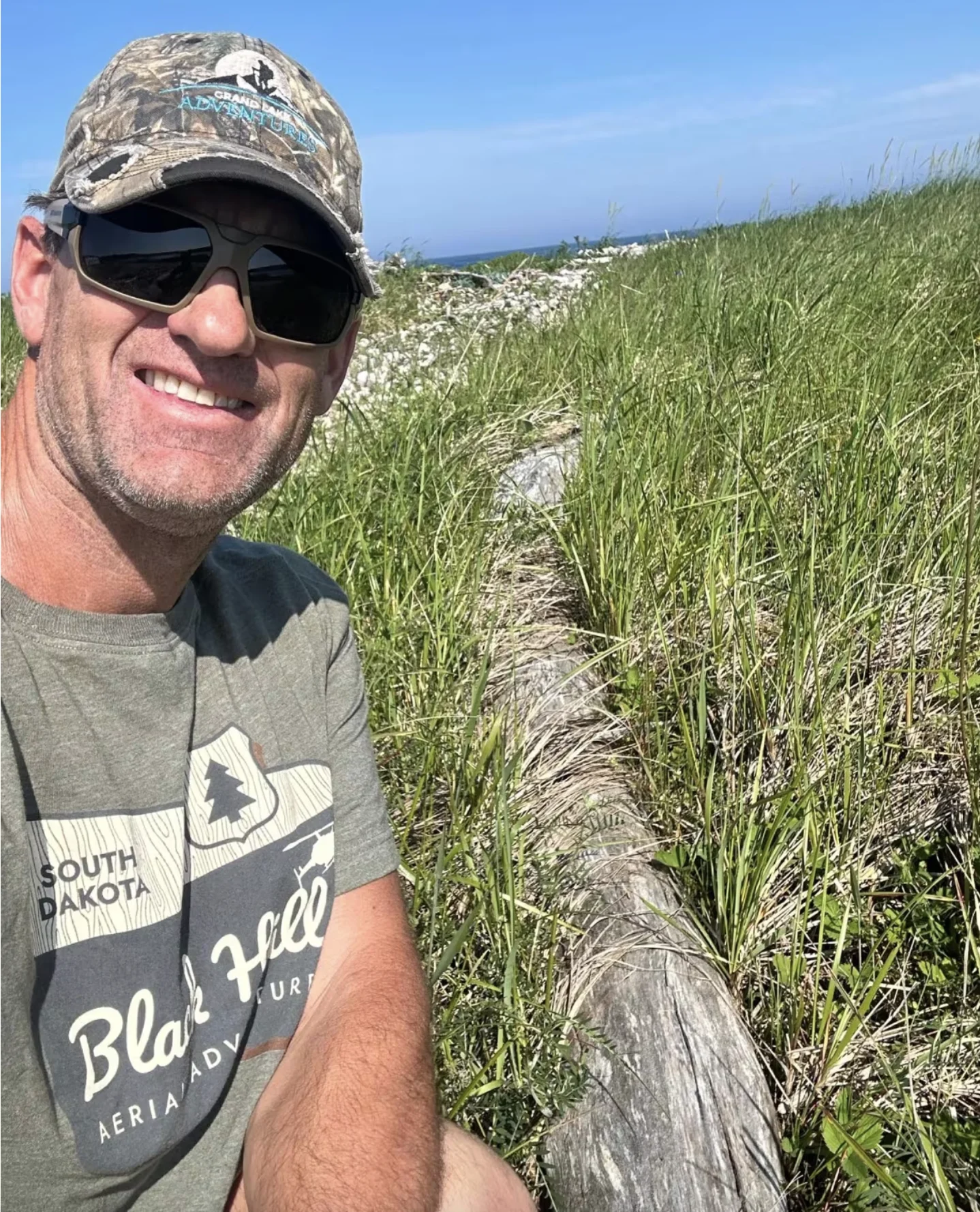 CBC: Tony Pottle recently saw a garter snake on this log near the Robinsons River. He captured the snake on video along with a panoramic view of the area in which it was found. (Submitted to CBC by Tony Pottle)