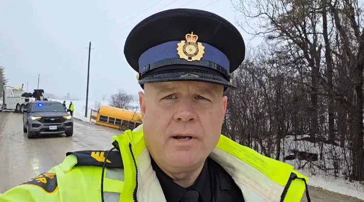 CBC: OPP Sergeant Ed Sanchuck on the scene of a school bus crash in Oxford County on Feb. 18, 2026 (OPP West Division)