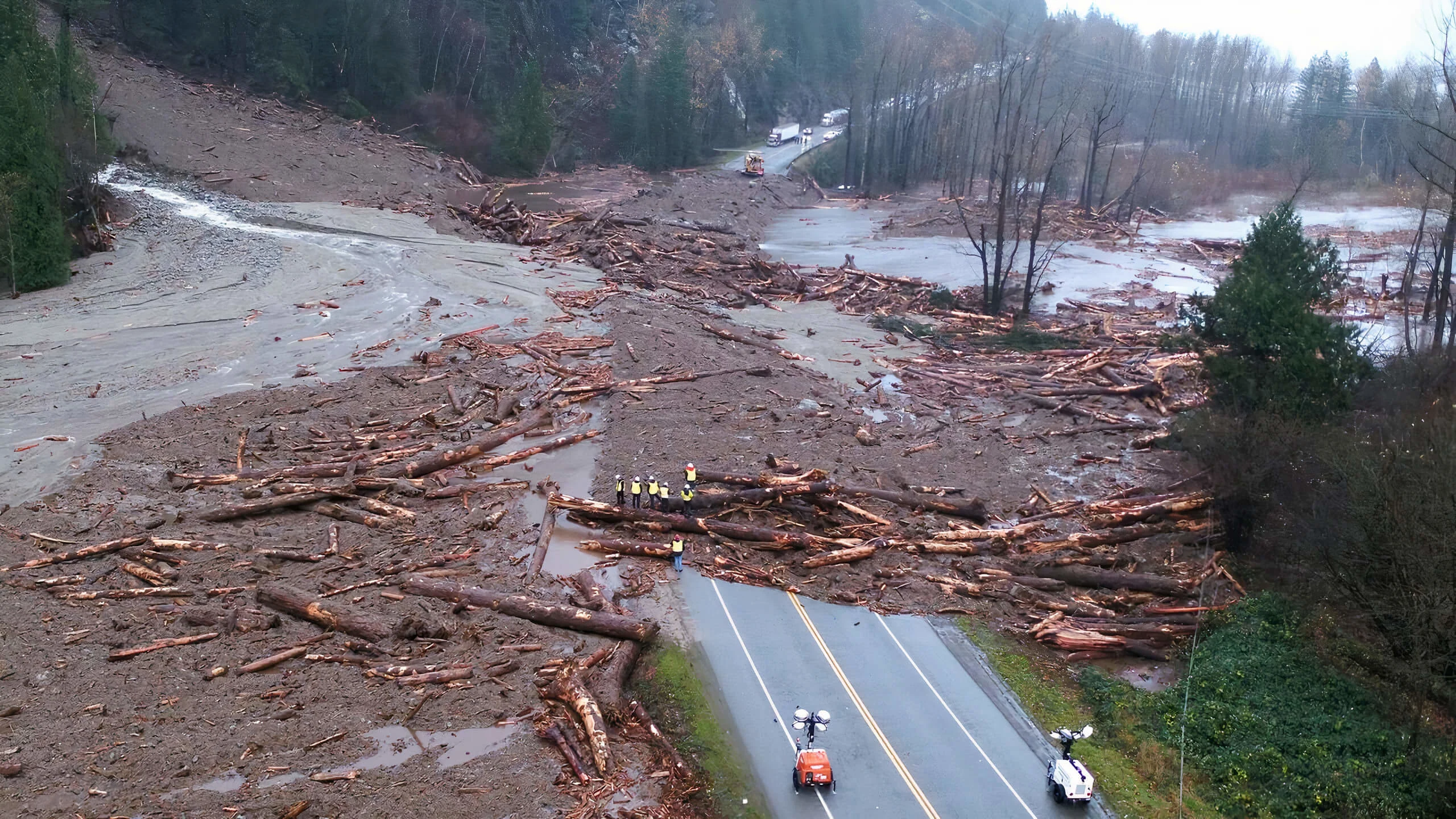 Crews assess a large landslide across Highway 7 at Ruby Creek, B.C., in November 2021. The slide was one of several that paralyzed the transportation industry moving goods between the Lower Mainland and the Interior. (B.C. Ministry of Transportation and Infrastructure)