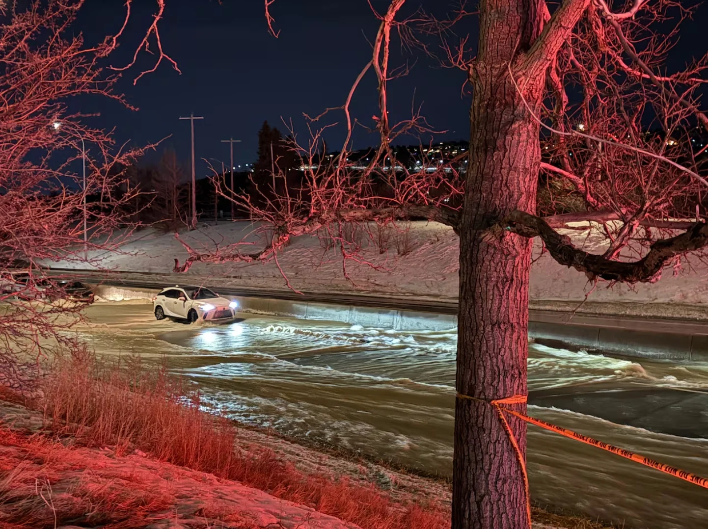 CBC: The Calgary Fire Department searched seven cars to rescue 13 people following flooding in northwest Calgary. (Chris dela Torre/CBC)