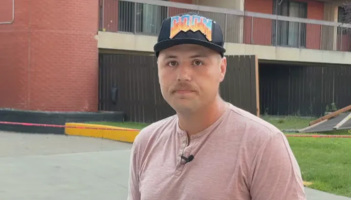 CBC - Edmonton resident with storm damage - Sam Brooks