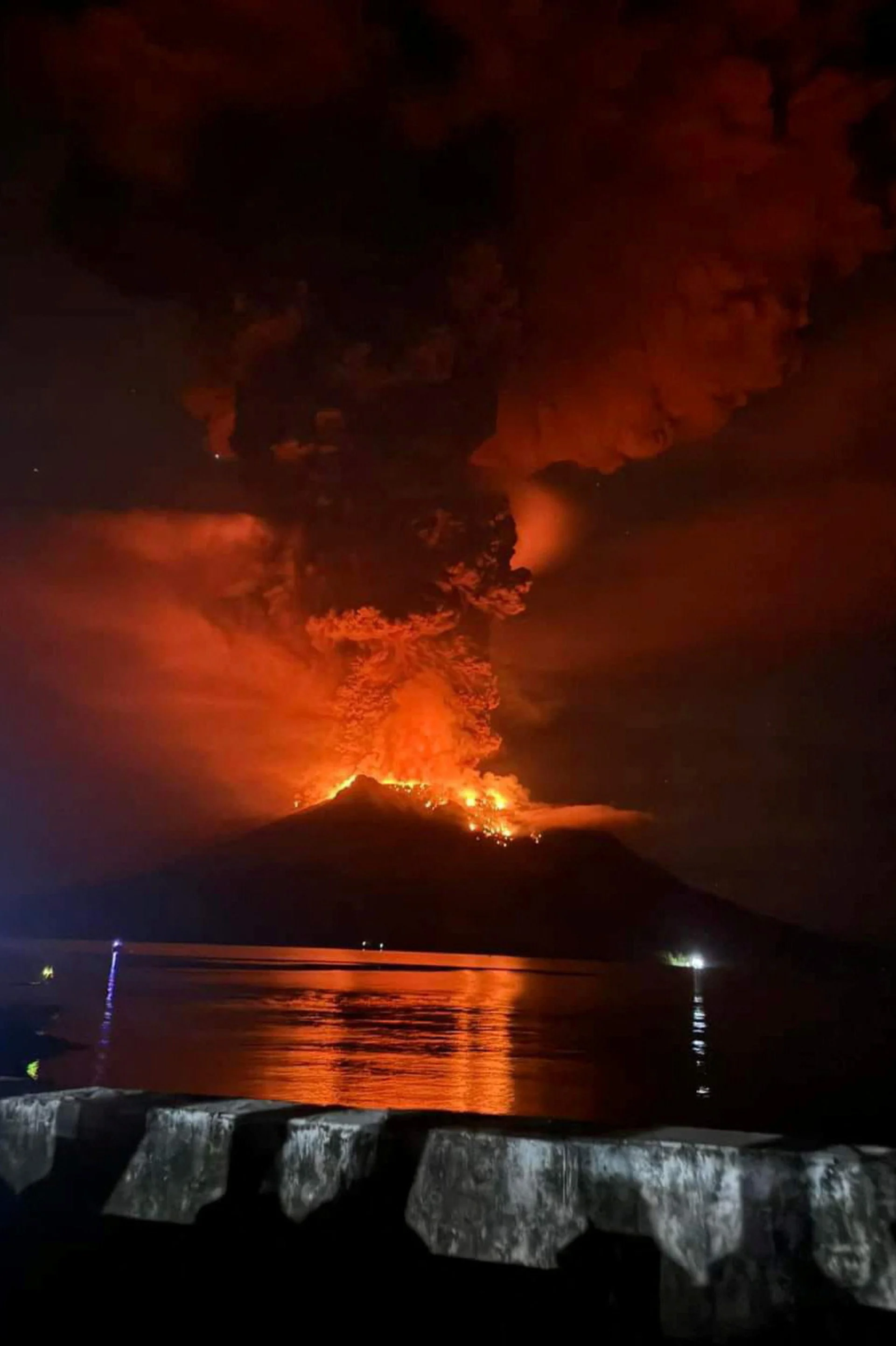 REUTERS: Hot lava flows from Mount Ruang volcano during an eruption in Sitaro, North Sulawesi province, Indonesia, April 17, 2024. Antara Foto/HO/BPBD Kab Sitaro/via REUTERS