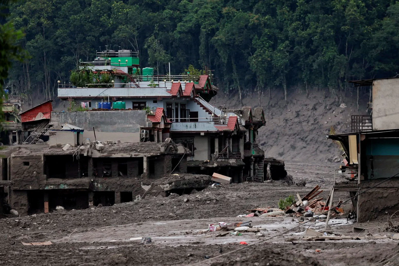Damaged houses following a flash flood at Trishuli in Nuwakot district, Nepal, August 26, 2026 - REUTERS - Navesh Chitrakar
