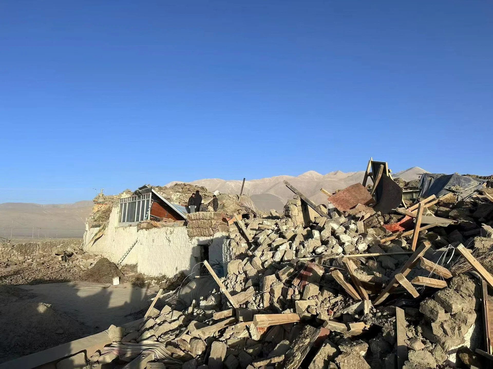 REUTERS: Damaged houses are pictured after an earthquake at a village in Shigatse, Tibet Autonomous Region, China January 7, 2025. Xinhua via REUTERS