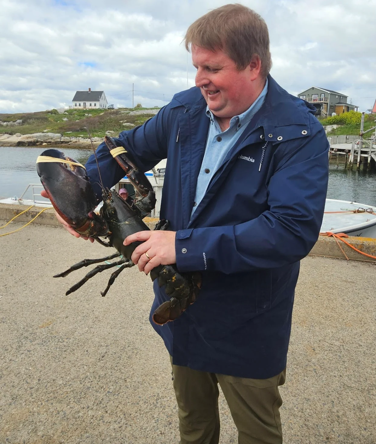 Nathan Coleman: Holding large lobster in Nova Scotia