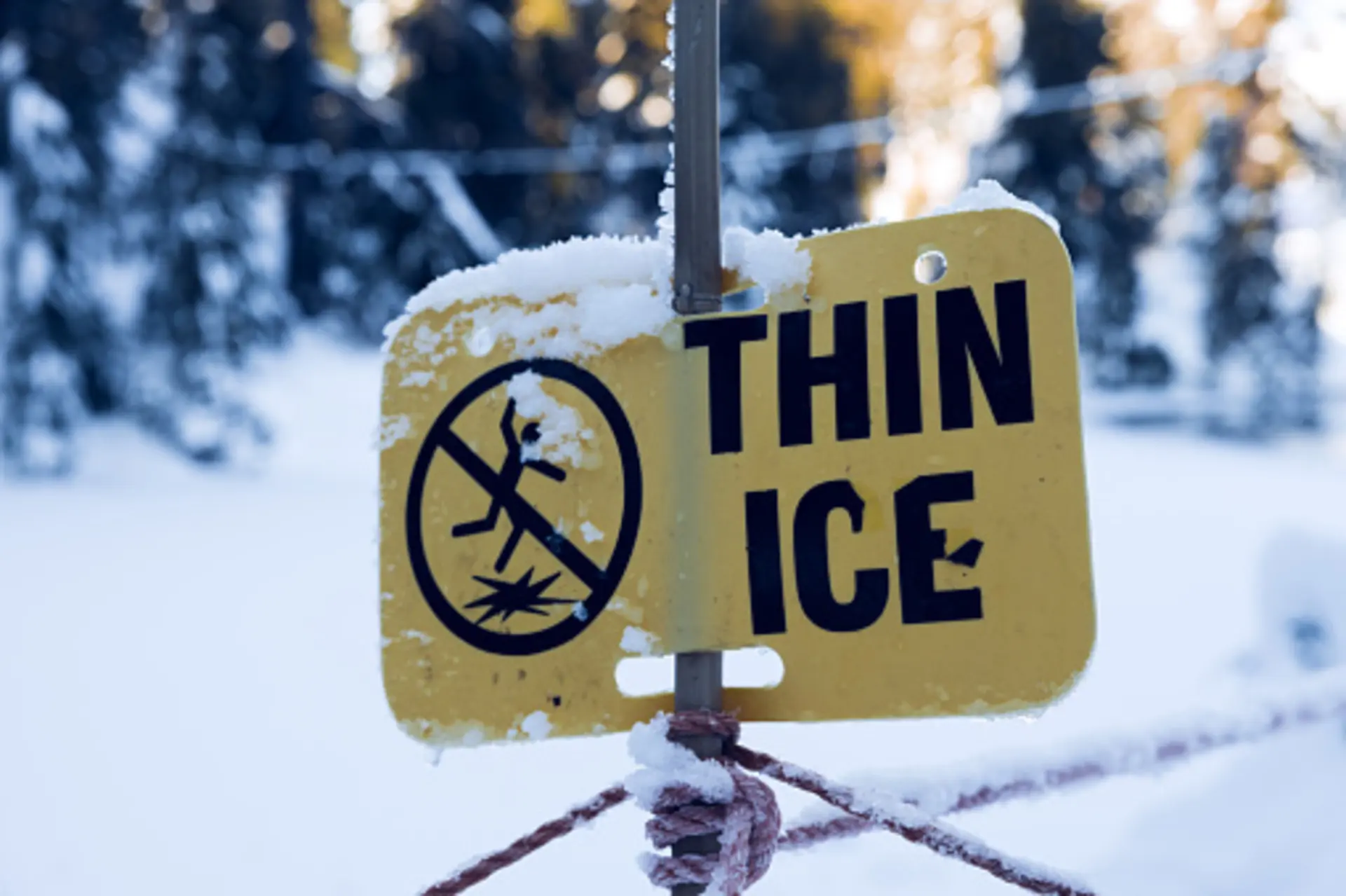 Sign Thin Ice And Footprints On Snow And Ice Stock Photo, Picture