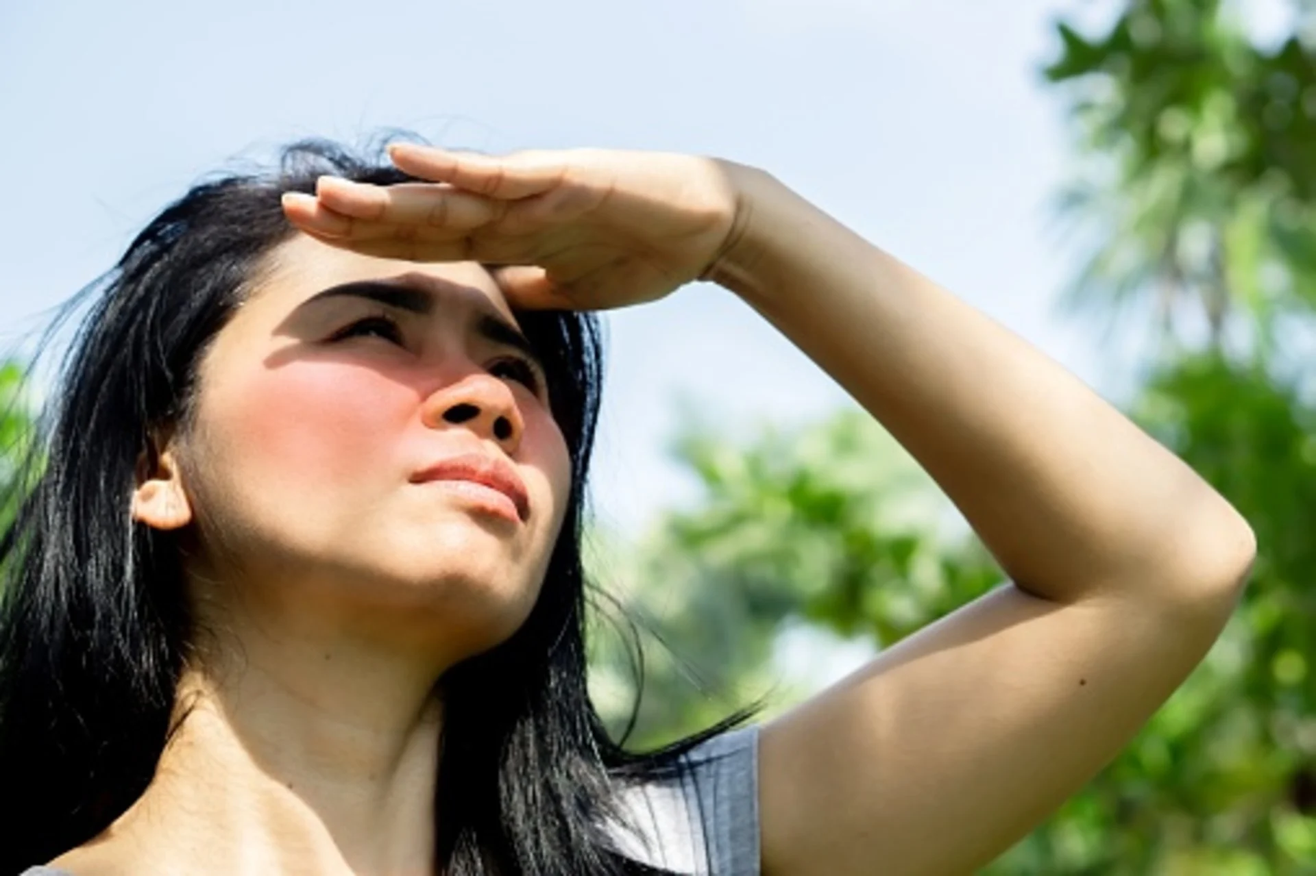 Getty Images. Credit: Doucefleur Creative #: 1313851761 | woman having problem sunburn redness on face skin hand cover her face to protect ultraviolet from sunlight - stock photo. Sun, sunshine, heat. Credit:	Doucefleur Creative #:	1313851761. Link: https://www.gettyimages.ca/detail/photo/asian-woman-having-problem-sunburn-redness-on-face-royalty-free-image/1313851761?phrase=trouble+seeing+in+sun&adppopup=true