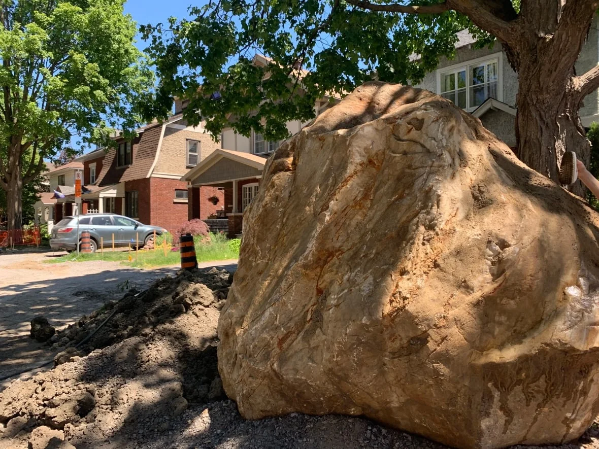 Residents fight to save huge ancient rock unearthed in Ontario city