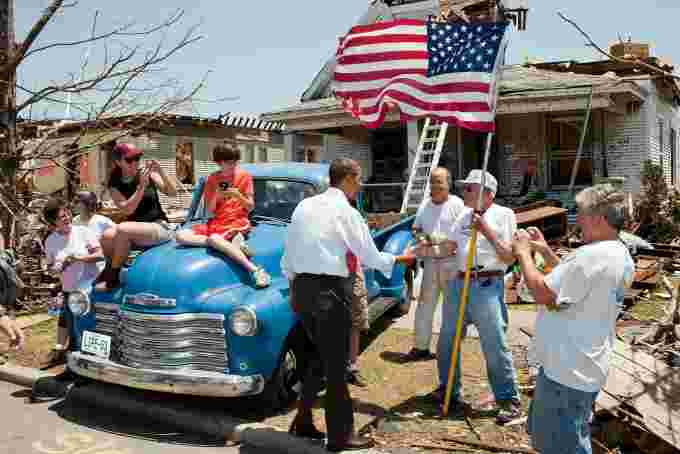 President Obama greets a tornado survivor on May 29, 2011