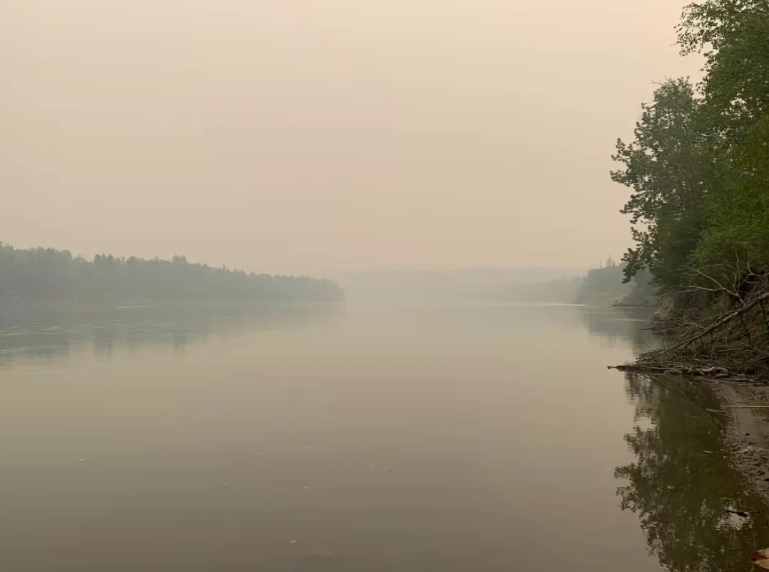 CBC: Smoke blankets the North Saskatchewan River in Edmonton on May 20, 2023. (Paige Parsons/CBC)