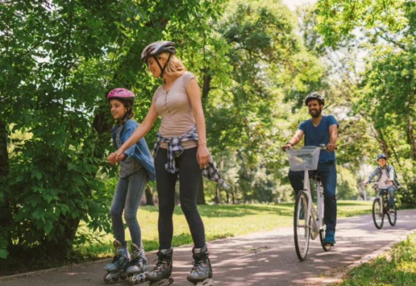 Getty Images Thumb: Family biking, hiking outdoors