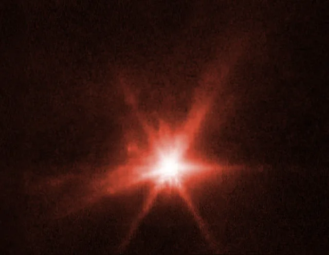Pow! Immense debris cloud from DART impact spied by Hubble and JWST ...