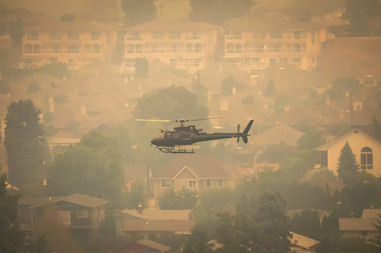 A helicopter is pictured near the Bald Range wildfire in Summerland, British Columbia, on Saturday, Aug. 8, 2026. (Ben Nelms/CBC)