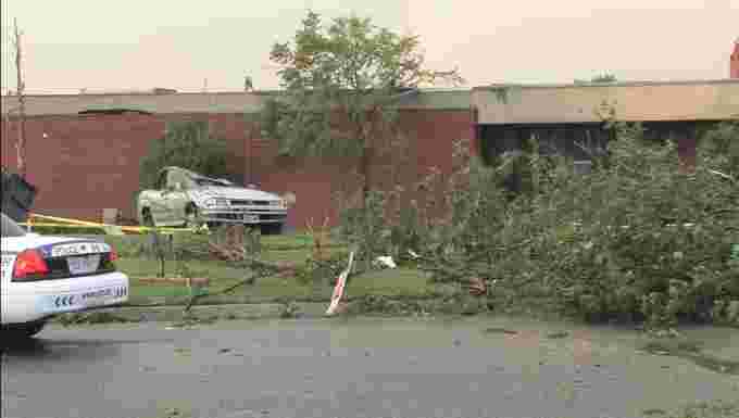 WIki Creative Commons: Vaughan Tornado, 2009. Theonlysilentbob. Link: https://commons.wikimedia.org/wiki/Category:Southern_Ontario_Tornado_Outbreak_of_2009#/media/File:Crushed_car_tornado_aftermath_on_the_lawn_of_a_school_in_Woodbridge.jpg