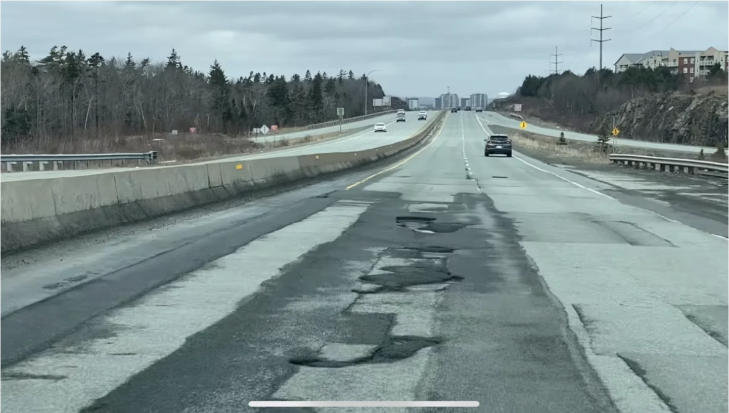 CBC: Potholes on Highway 102 outbound in Halifax. Recent data from Service Nova Scotia shows most people who make claims for pothole damage to their vehicles do not receive compensation from the province. (Anjuli Patil/CBC)