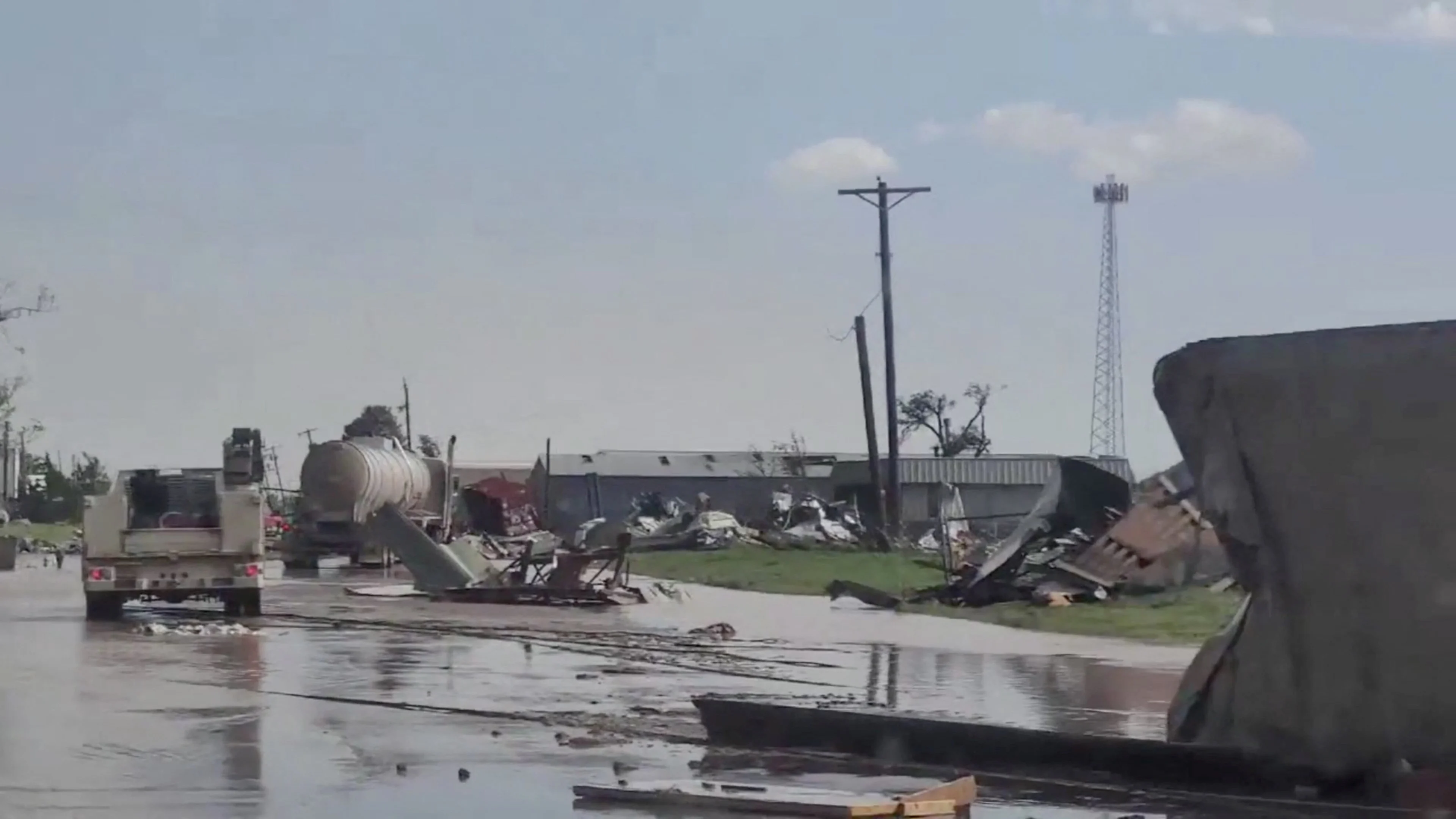 Reuters: A view of a damaged site in Perryton as the town gets struck by a tornado, in Texas, U.S. June 15, 2023, in this screengrab obtained from a social media video. Sabrina Devers via TMX/via REUTERS