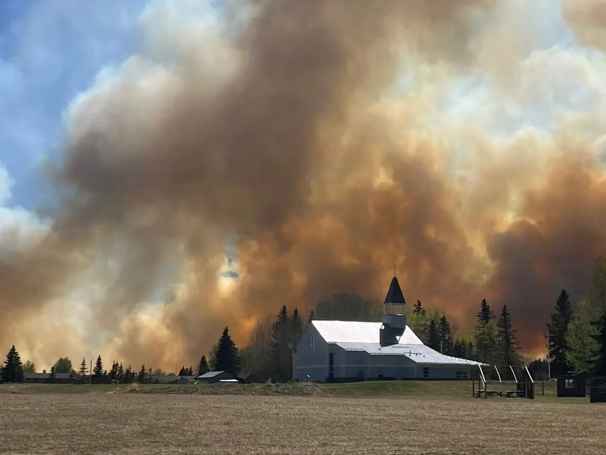 (CBC) Wildfire smoke Entwistle Community Church Alberta May 5 2023