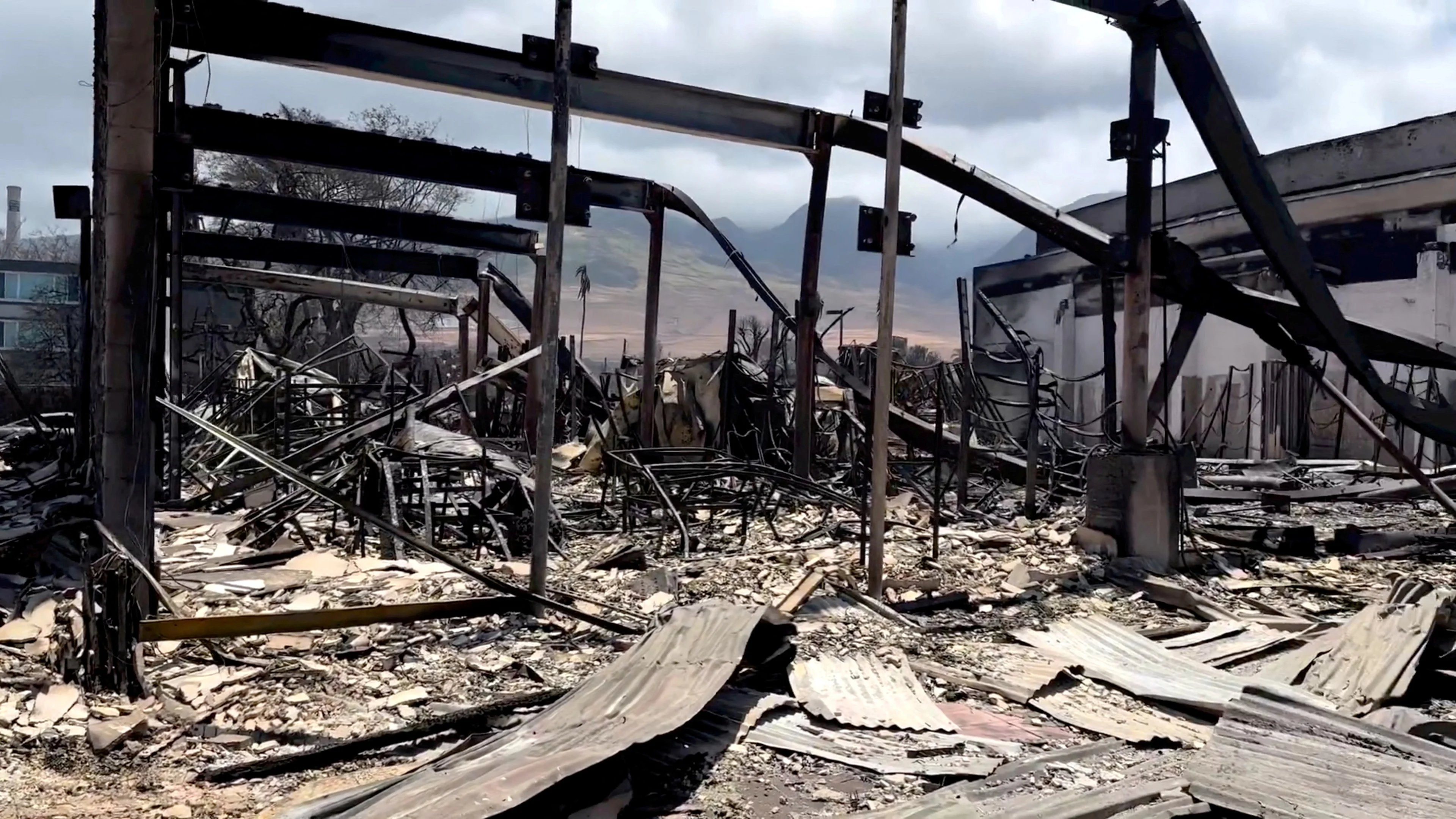 REUTERS: A view of damage cause by wildfires in Lahaina, Maui, Hawaii, U.S. August 10, 2023, in this screen grab obtained from a social media video. Senator Brian Schatz via Instagram/via REUTERS