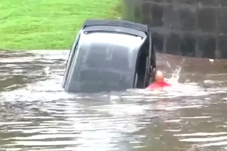 Dramatic rescue shows why you shouldn't drive in flood water