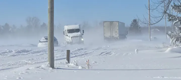 Trucks and cars stranded on a snowed-over highway between London and Sarnia on Saturday, Feb. 7, 2026. (Ontario Provincial Police)