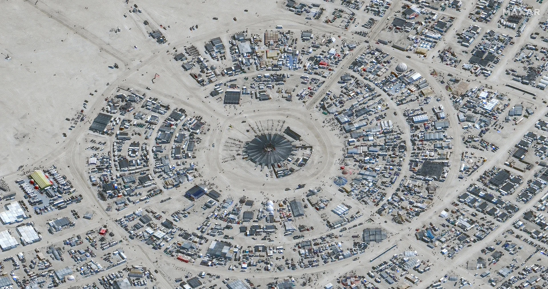 One death reported at Burning Man, thousands stranded in mud and rain