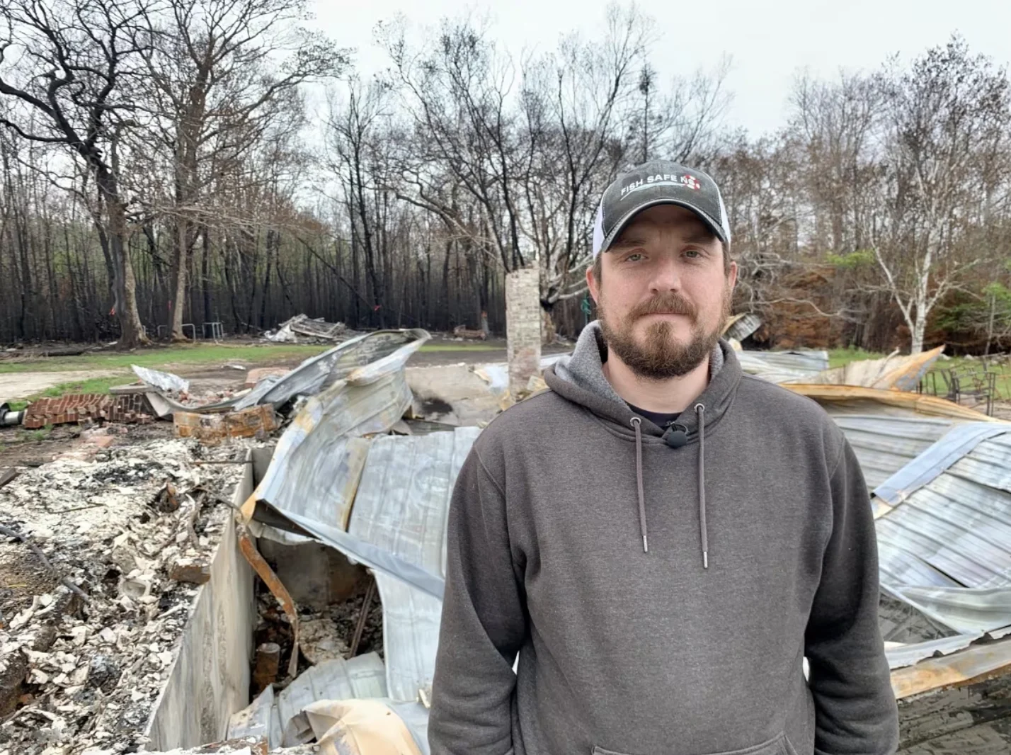 CBC: Kasey DeMings is a fisherman and volunteer firefighter who lost his own home in the Shelburne County wildfire in May. (Shaina Luck/CBC)
