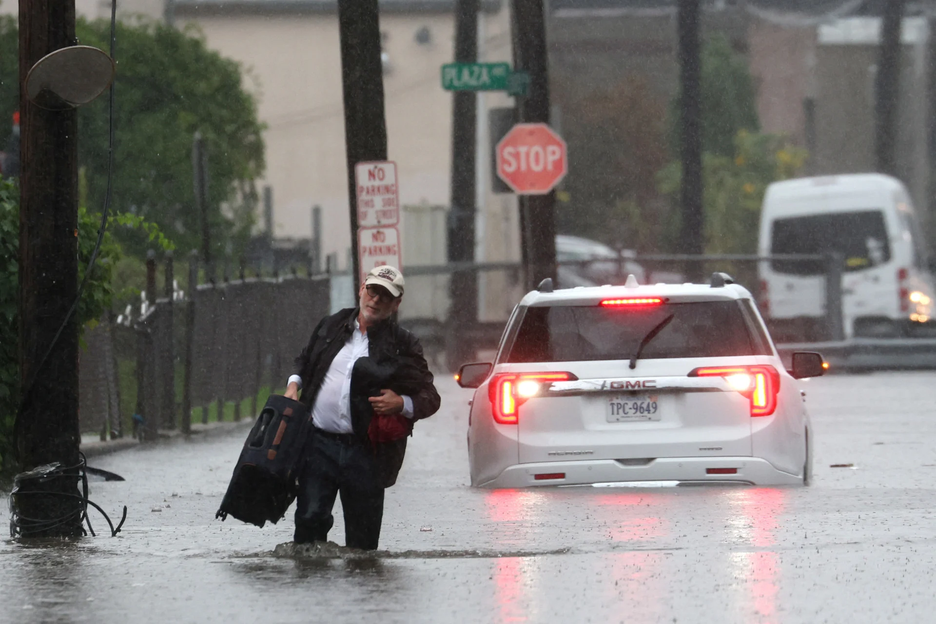 Streets turn into small lakes in New York as heavy rain triggers flooding