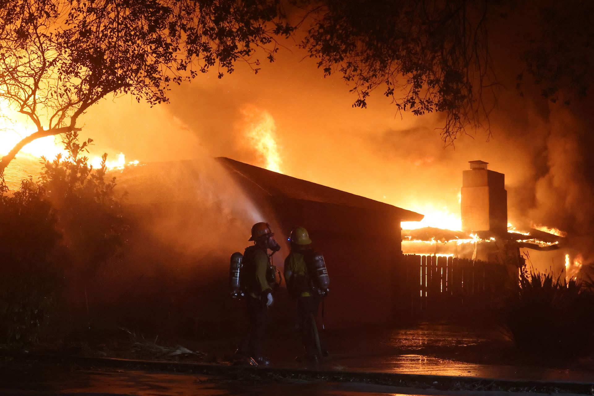 Los Angeles wildfires rage as strong winds put millions at risk The