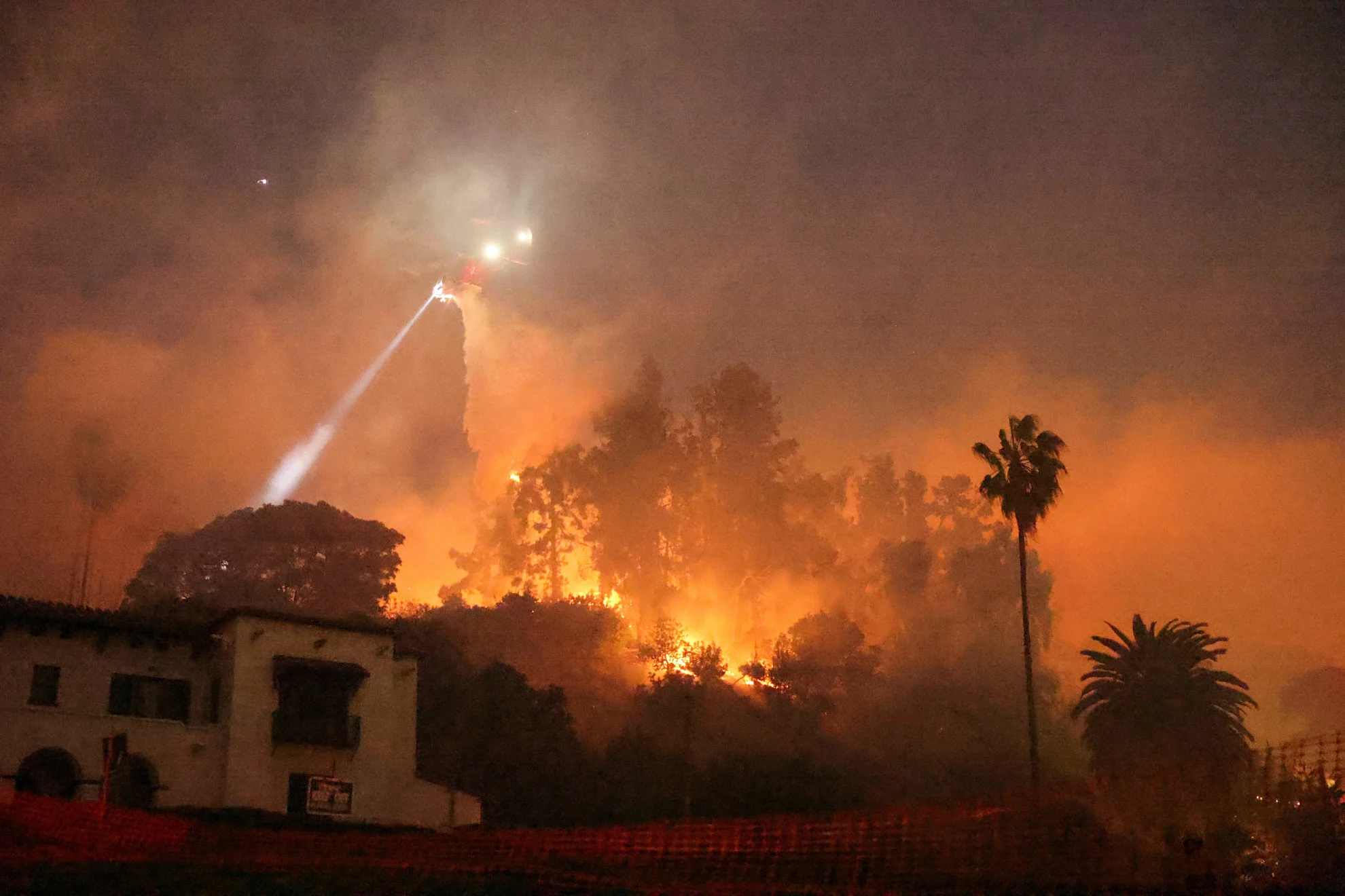 Ring of fire tightens around Los Angeles as Hollywood Hills burn