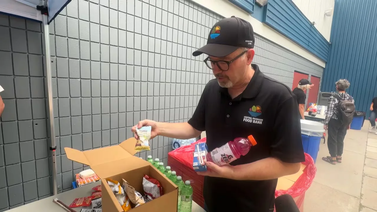 CEO of the Central Okanagan Food Bank, Trevor Moss, says volunteers in West Kelowna have been feeding wildfire evacuees with full meals and easy-to-grab boxes filled with instant foods. (Brady Stachan/CBC)