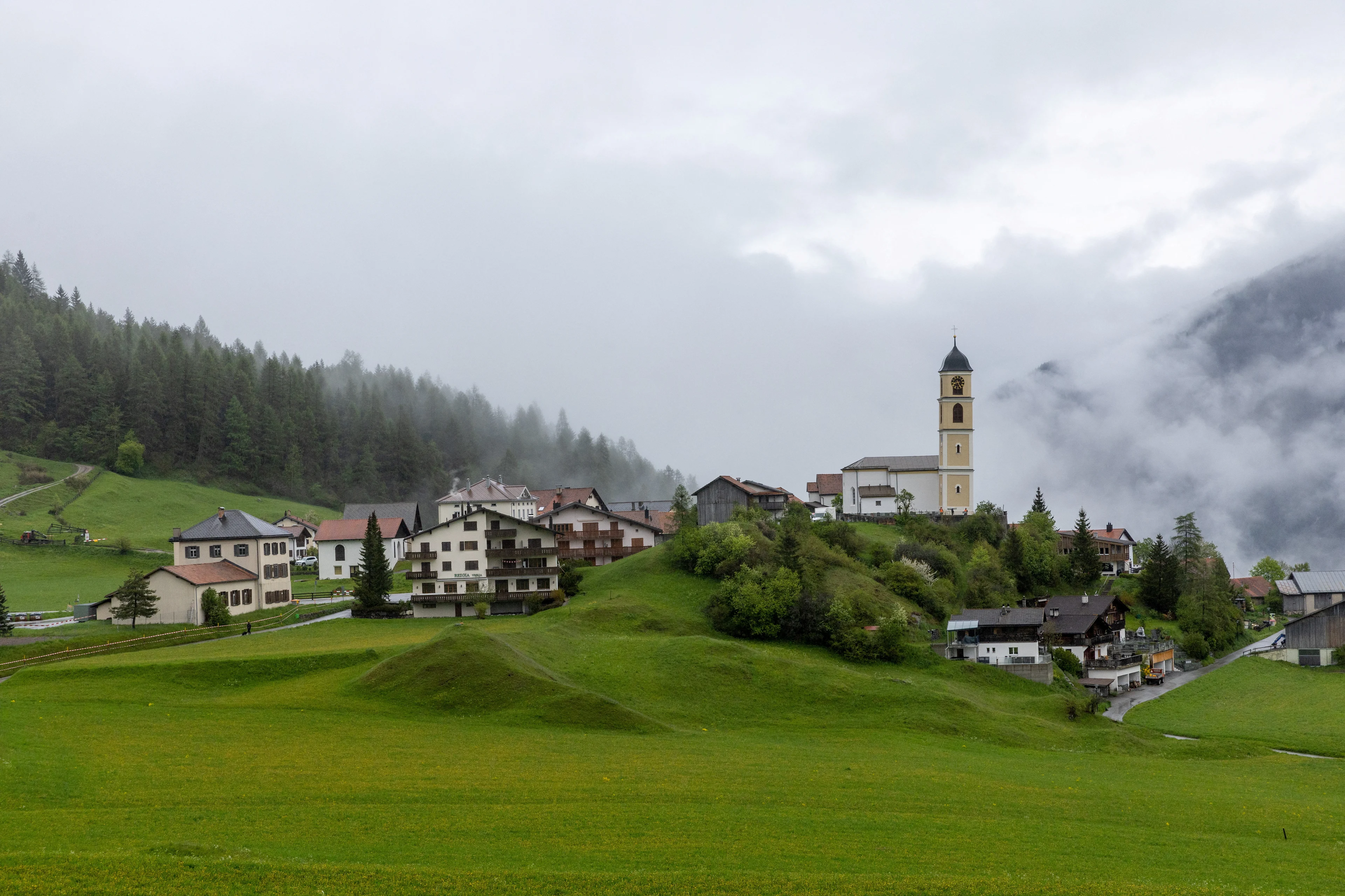 REUTERS: A general view of the zone where rocks are falling and the village of Brienz, one day ahead of the deadline for habitants to evacuate in the canton of Graubunden, Switzerland, May 11, 2023. REUTERS/Denis Balibouse